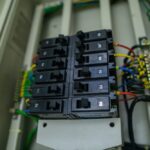A distribution board or DB box of an office. It is an electricity supply system that divide electrical power and acts as circuit breaker.