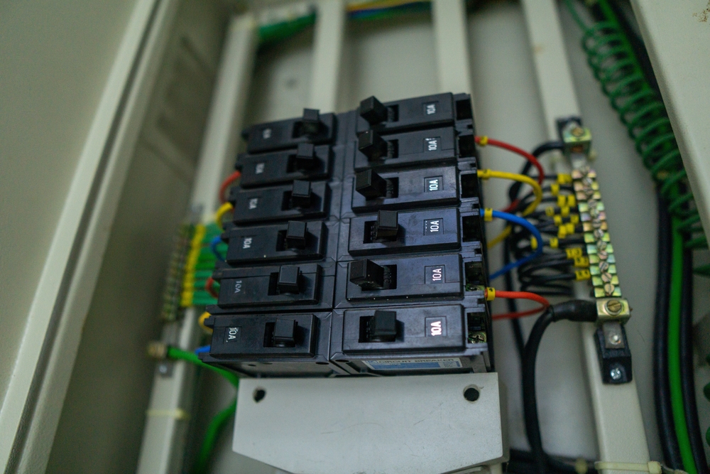 A distribution board or DB box of an office. It is an electricity supply system that divide electrical power and acts as circuit breaker.